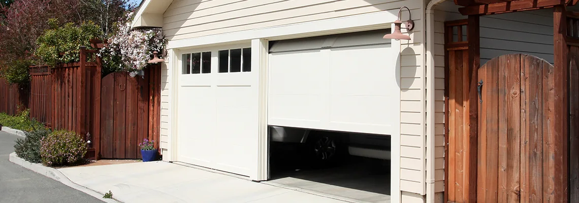 Fix Metal Garage Door Jerking in London, Ontario